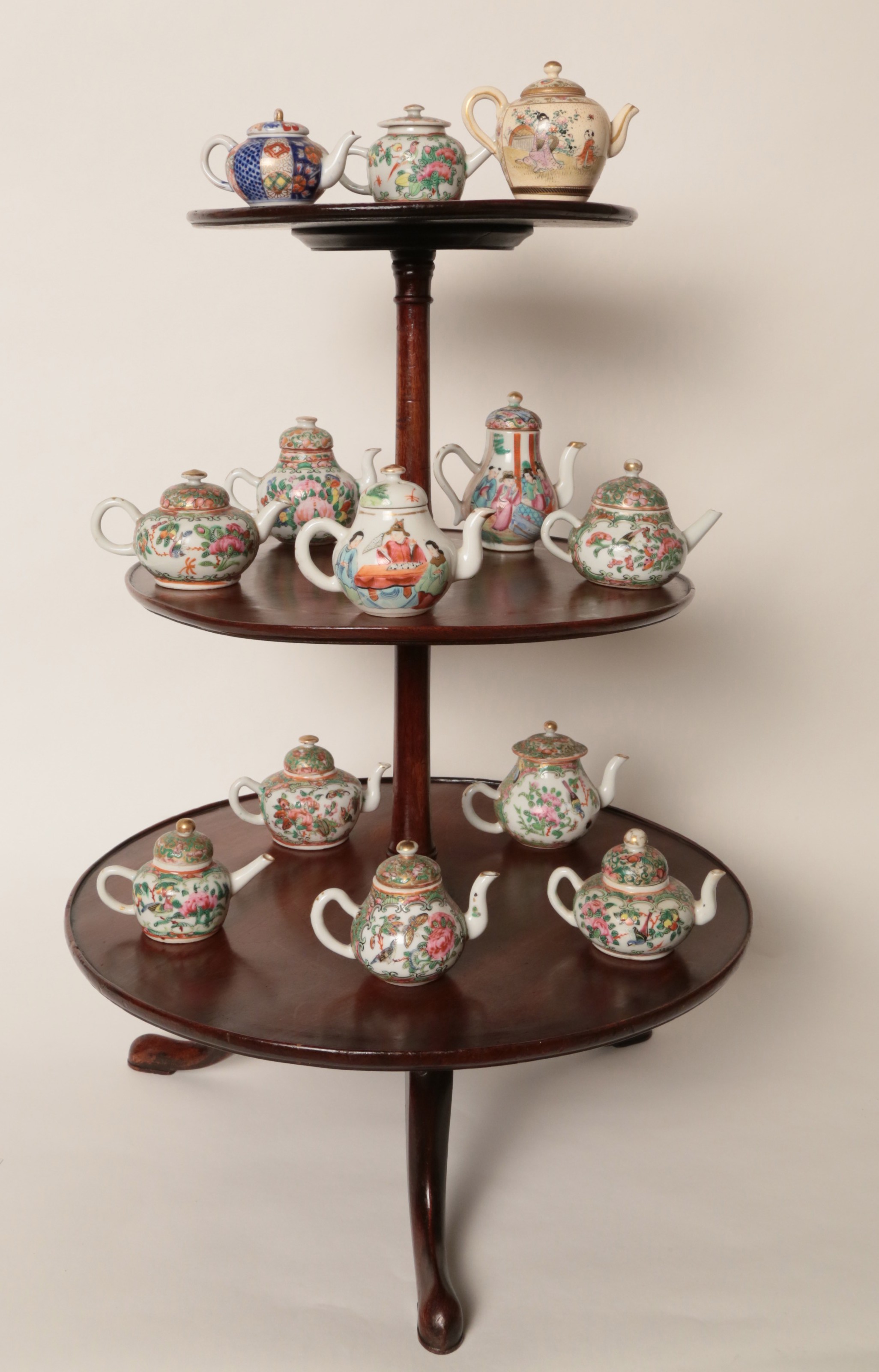 Chinese Teapots Collection of 13 Miniature Chinese Teapots, circa