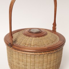 Harry A. Hilbert Covered Round Swing Handle Nantucket Basket