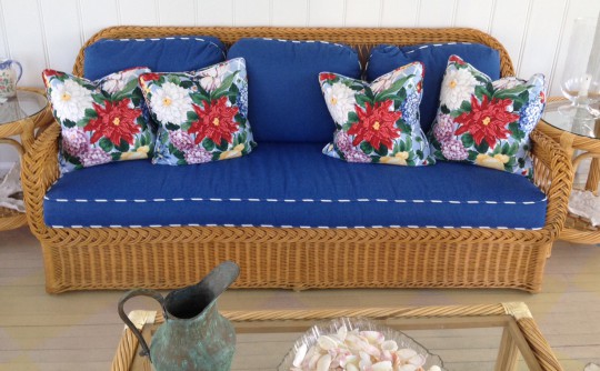 Wicker Sofa with Navy Blue Upholstered Cushions