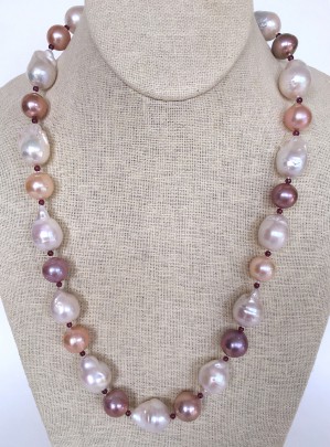 White Fresh Water Baroque and Pink Pearl Necklace, with garnet spacers.