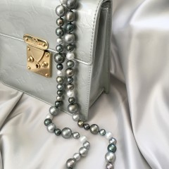 Fine 9mm-16mm White South Sea and Tahitian Pearl Cocktail Necklace, with 18k white gold clasp, 82 pearls total.