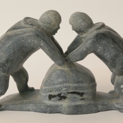 Inuit Stone Carving of Two Men at Work