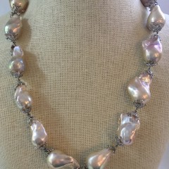 14mm - 30mm Pink Fresh Water Baroque Pearl Necklace, with sterling silver mountings and clasp.