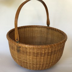 Ferdinand Sylvaro (1868-1952) Round Open Swing Handle Nantucket Basket, with partially obscured label on base.