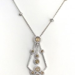 18k White Gold and Diamond Pendant, set with 9 yellow diamonds and 159 round diamonds and 4 diamond roundels on an 18k gold chain.