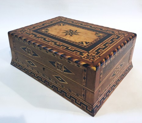 19th Century Multi-Wood Inlaid Sailor’s Lap Desk, with star, quarter fans and geometric inlay.