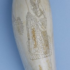 Two Fine and Large Boldly Stippled and Polychromed Sperm Whale Teeth by Manual Monteiro