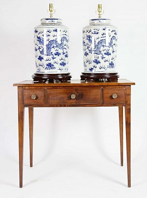 Tiger Maple Hepplewhite Three-Drawer Server with Pair of Blue and White Dragon Lamps