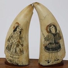 A Fine Pair of Whaleman Polychrome Scrimshaw Sperm Whale Teeth