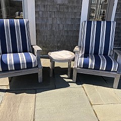 Pair of Gloster Teak Armchairs with Blue and White Cushions and Round Teak Table