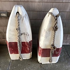 Four Colossal Red and White Painted Buoys