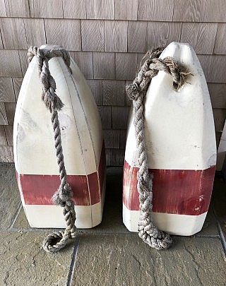 Four Colossal Red and White Painted Buoys