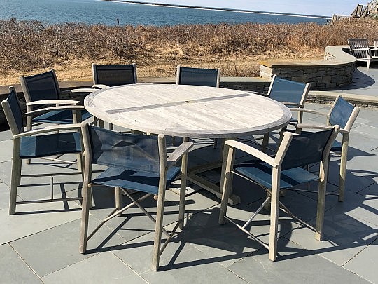 Round Teak Outdoor Dining Table with 8 Assembled Chairs with Blue Woven Seats and Backs