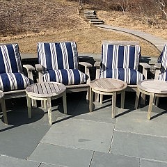 Four Gloster Teak Armchairs with Blue and White Cushions and 4 Round Teak Side Tables