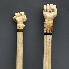 Whaler Carved Whale Ivory Fist and Serpent Walking Stick and Whale Ivory and Whalebone Carved Fist Knob Walking Stick