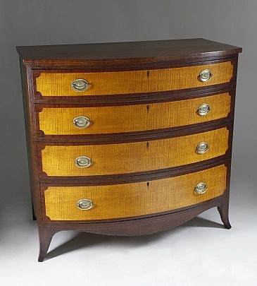 American Mahogany and Tiger Maple Bow Front Chest of Drawers