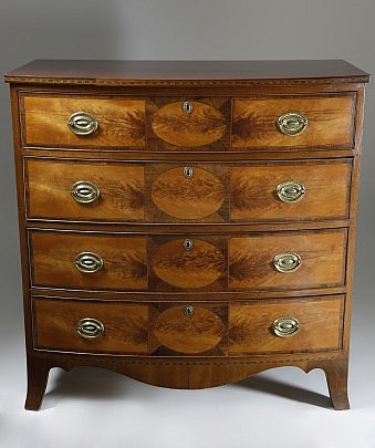 SATINWOOD AND ROSEWOOD INLAID MAHOGANY BOW-FRONTED CHEST OF DRAWERS