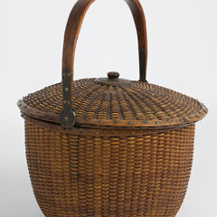 Rare and Unusual Covered Round Swing Handle Nantucket Basket, circa 1850-60