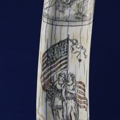 American Scrimshawed and Polychrome Walrus Tusk, 19th Century, signed W. Cahill