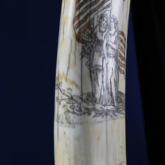 American Scrimshawed and Polychrome Walrus Tusk, 19th Century, signed W. Cahill