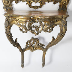 Louis XV Carved and Giltwood Mirror and Companion Serpentine Console Table, mid 18th Century