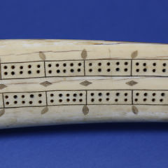 Inuit Scrimshaw Walrus Tusk Cribbage Board