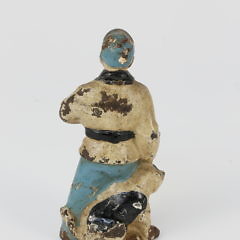 Antique Cast Iron Figural Doorstop of an Adolescent Scholar