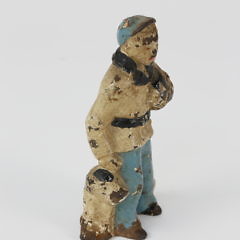 Antique Cast Iron Figural Doorstop of an Adolescent Scholar