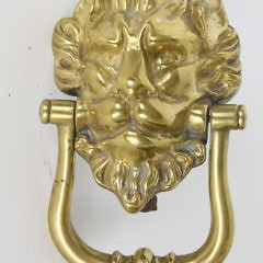 Three Antique Figural Brass Door Knockers