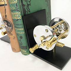 Pair of Polished Chrome and Brass Fishing Reel Bookends