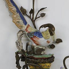 Pair of Castilian Porcelain and Gilt Metal Bird Sconces