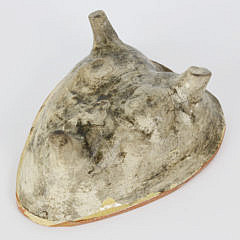 Two Tri-Footed Ceramic Molds