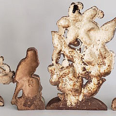 Four Antique Hubley Cast Iron Figural Doorstops
