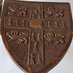 Pair of Antique English Carved Walnut Coat-of-Arms Stools