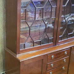 Vintage English Petite Mahogany Glazed Door Breakfront