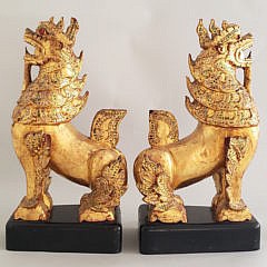 Pair of Carved and Gilt Tibetan Foo Dogs