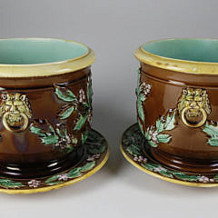 Pair of English Majolica “Holly” Pattern Cachepots with Stands