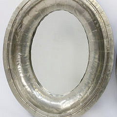 Two Riveted Silver Gilt Oval Mirrors