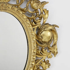 Pair of American Carved Giltwood Oval Mirrors, 19th Century