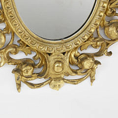 Pair of American Carved Giltwood Oval Mirrors, 19th Century