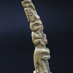 Carved and Stippled Northwest Walrus Ivory Totem, 19th Century