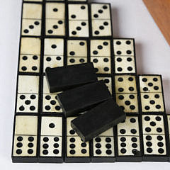 Complete Set of Sailor Made Antique Whalebone and Ebony Encased Dominoes