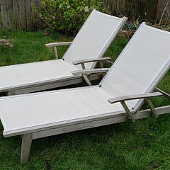 Pair of Gloster Teak Chaise Lounges and Side Tables