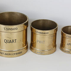 Set of 7 World War II English Royal Navy Bronze Standard Liquid Measures