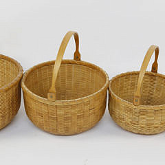 Nest of Four Arthur Martin Round Open Swing Handle Baskets