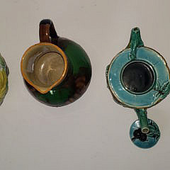 Four Antique Majolica Pitchers and Covered Tea Pot