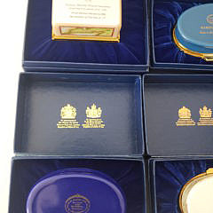 Collection of Eight Covered Nautical Decor Enamel Boxes