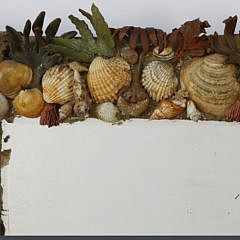 Shell Encrusted Mirror with Cut Leather Foliage and Tumbled Stones