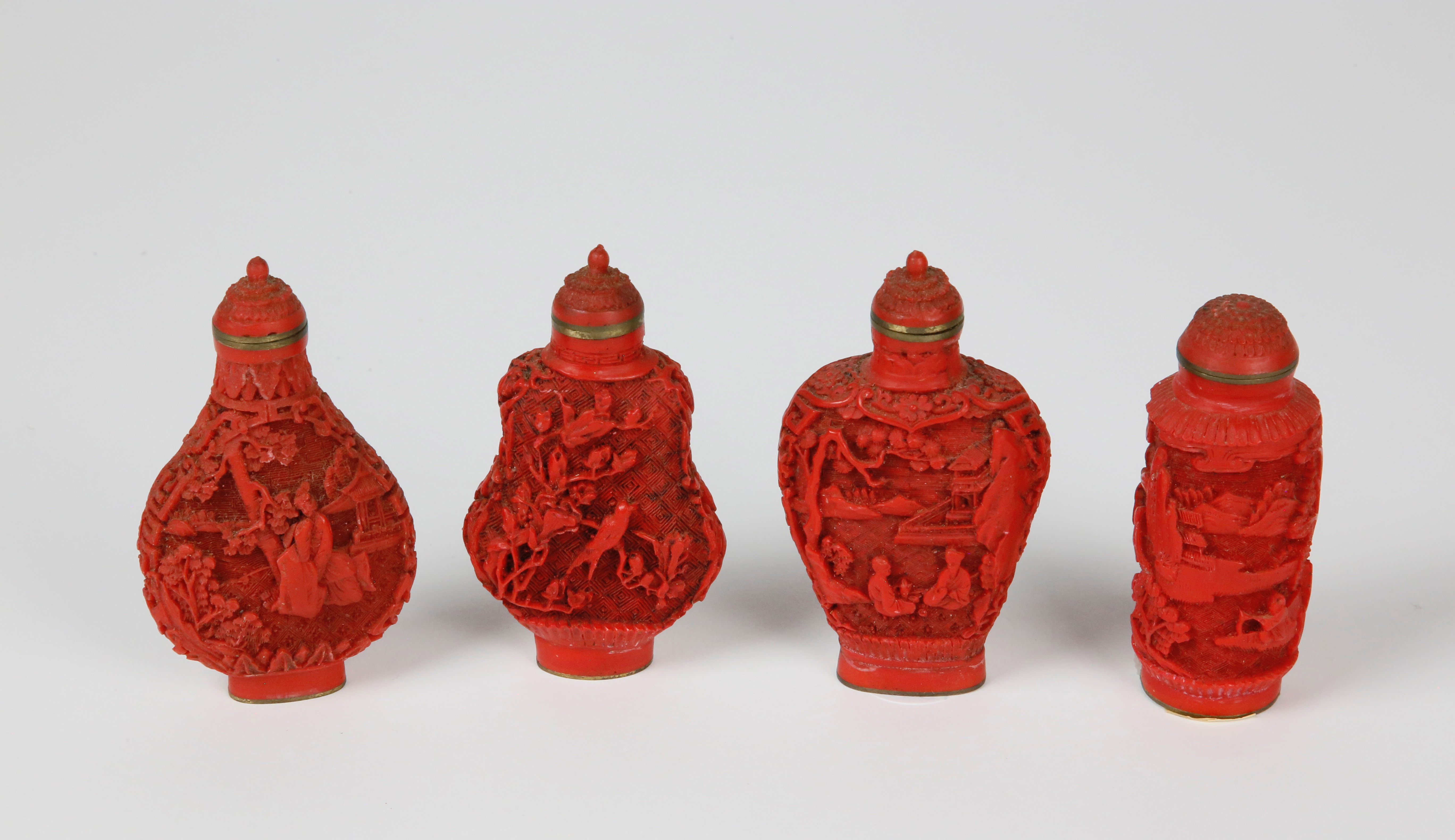 Four Vintage Chinese Carved Cinnabar Snuff Bottles - Four Vintage