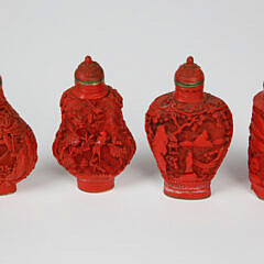 Four Vintage Chinese Carved Cinnabar Snuff Bottles